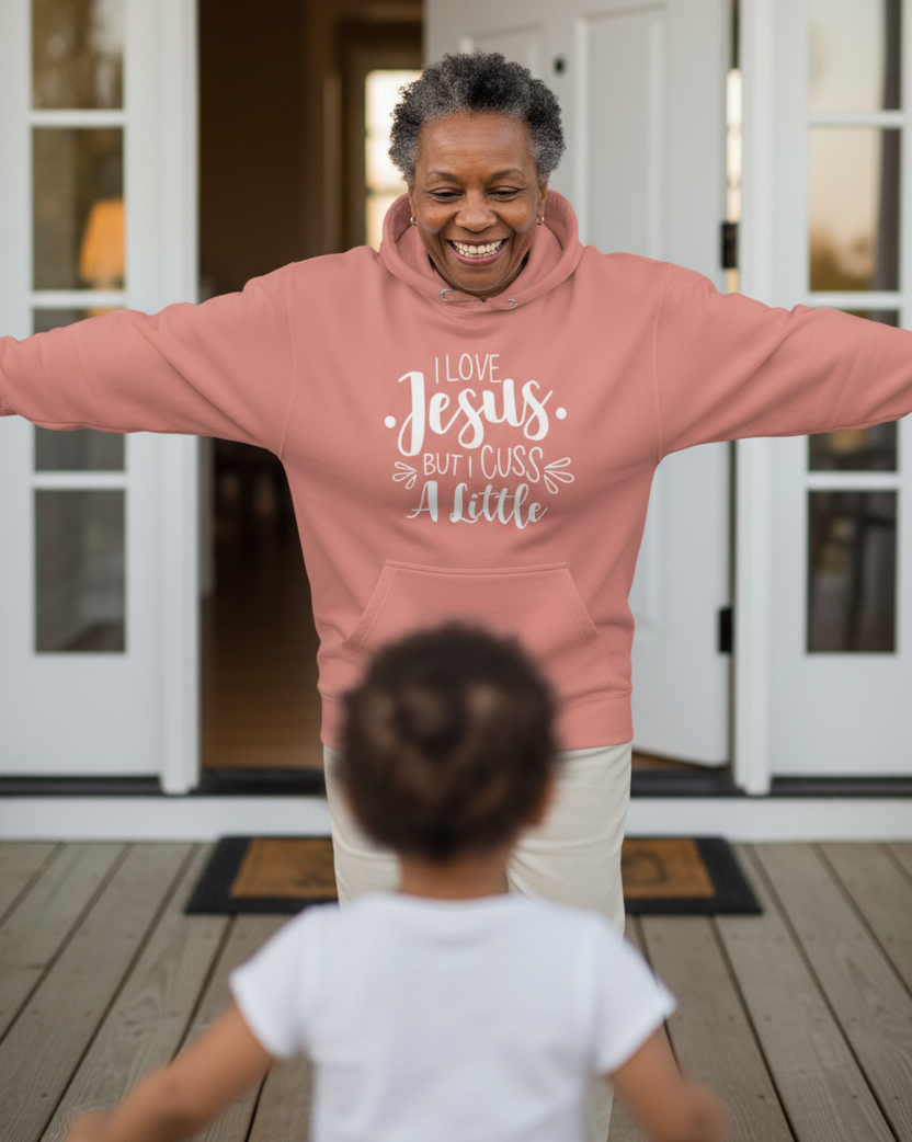 Unisex mauve pink Christian hoodie with "I Love God, But I Cuss a Little" text, made by MotherMindset, front view.