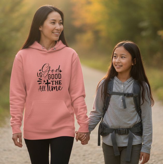 MotherMindset Christian hoodie with "God is Good All the Time" slogan, mauve pink unisex pullover sweatshirt, front view.