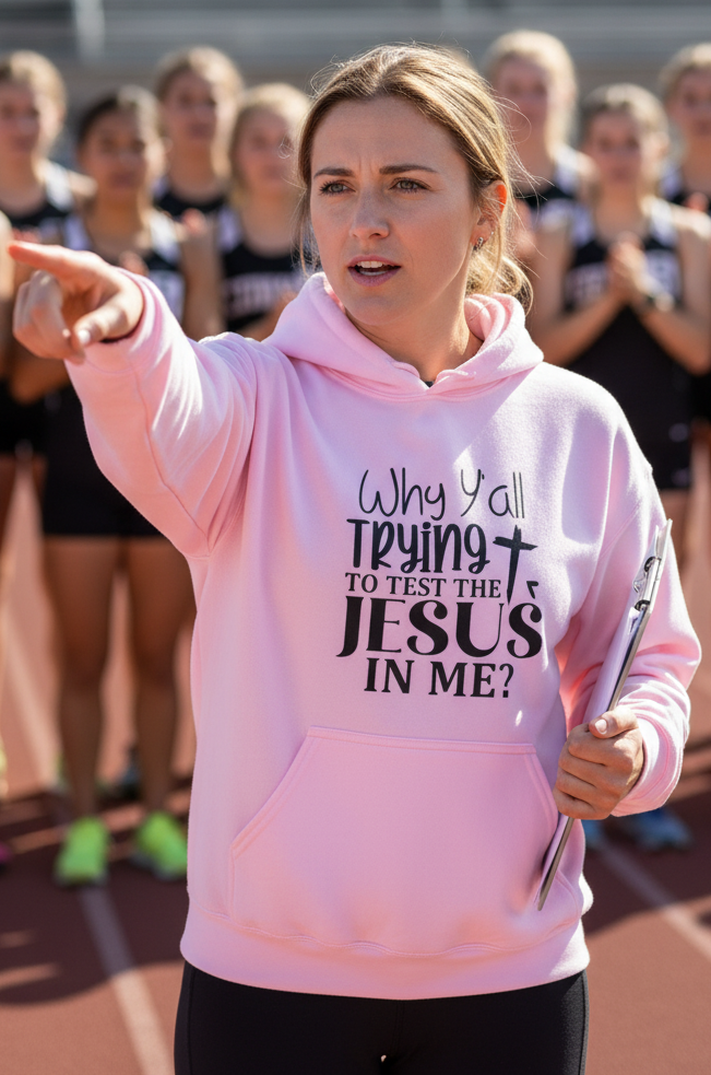 Light pink unisex Christian hoodie from MotherMindset with "Why Y'all Trying to Test Jesus in Me" slogan on front.